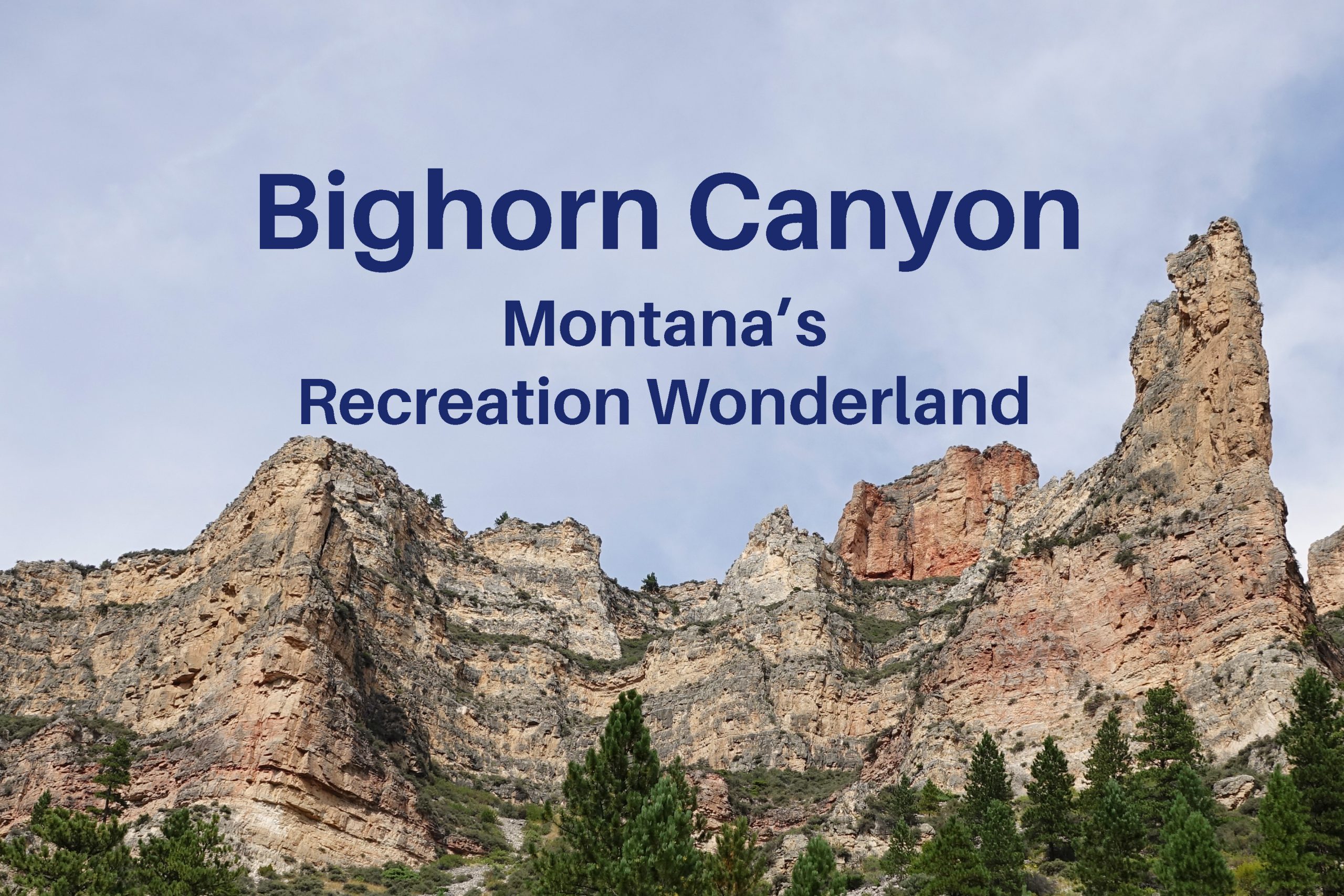 The colored layers in the sandstone cliffs add to the beautiful Montana scenery in Bighorn Canyon National Park.