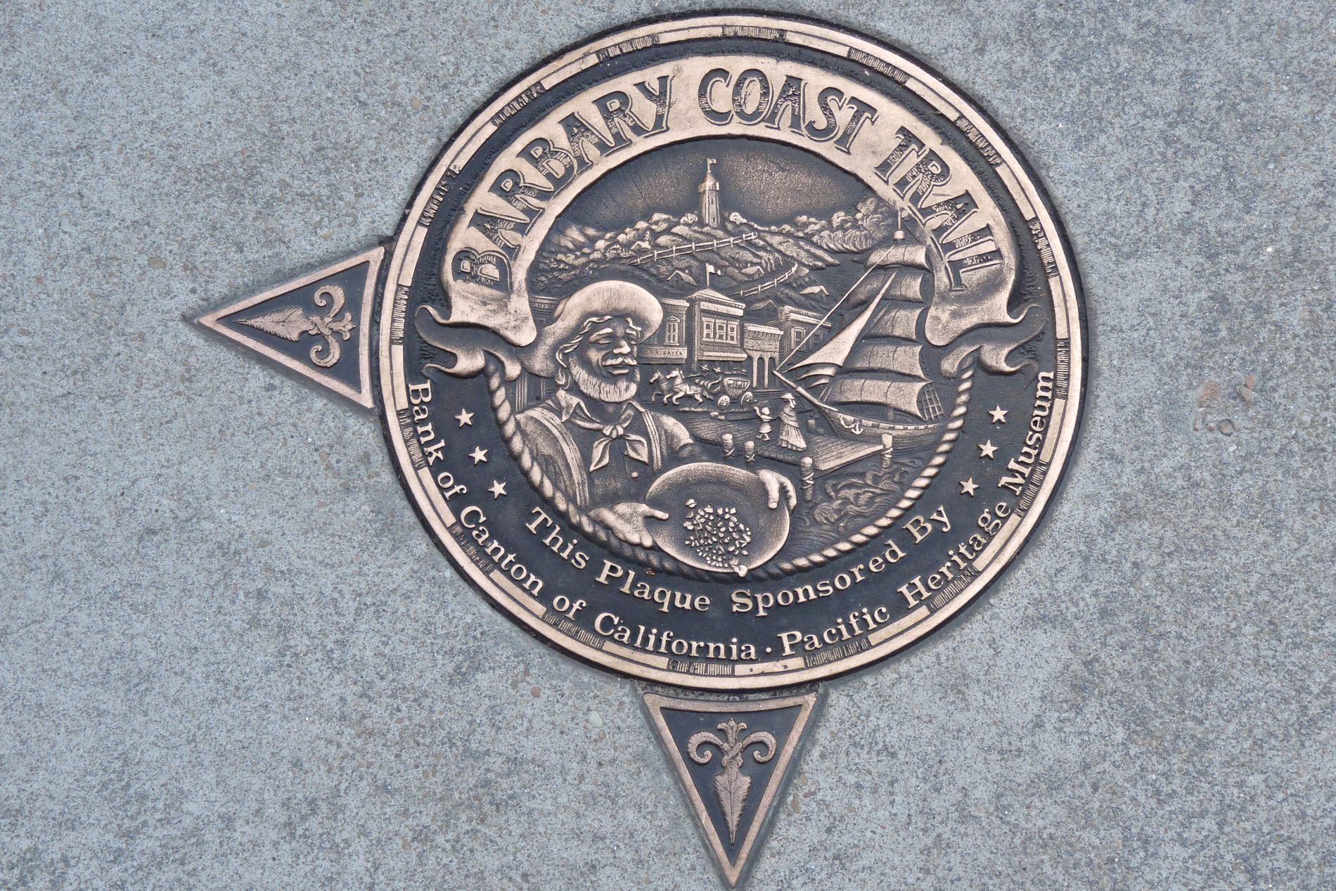 One of the bronze medallions embedded in the sidewalks to mark San Francisco’s Barbary Coast Trail.