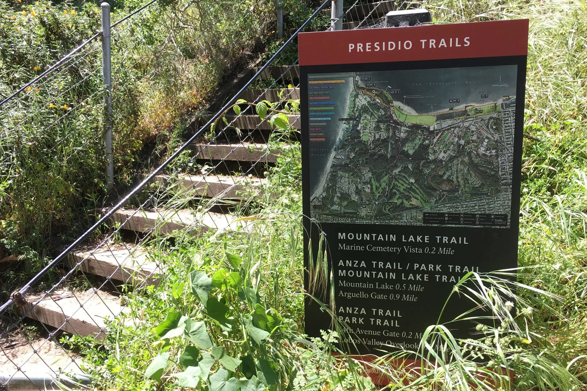 Presidio trail sign by the stairs up to the dune habitat boardwalk on Mountain Lake Trail.