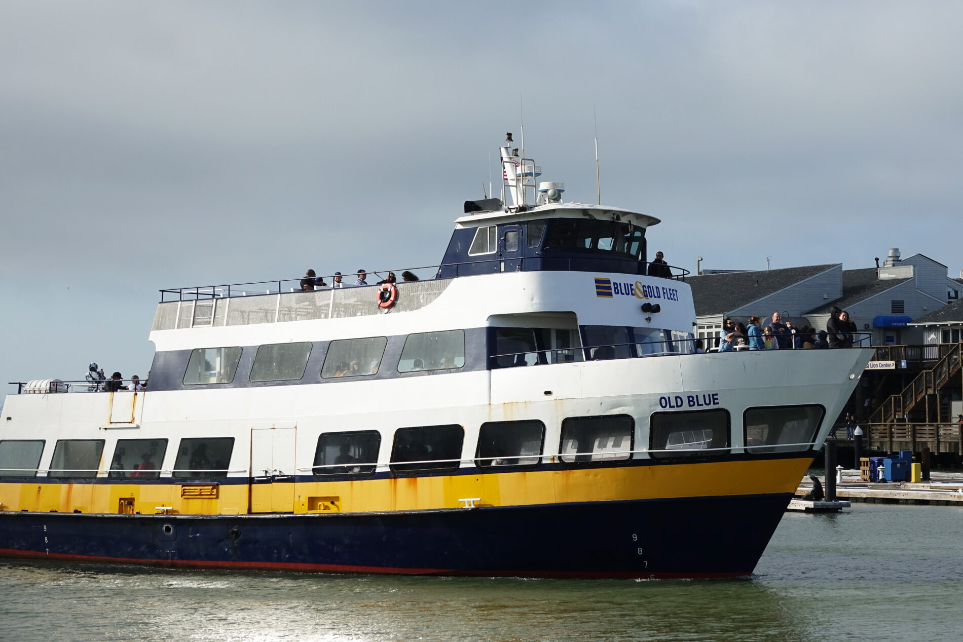 One of the Blue and Gold Fleet Bay Cruise boats entering the harbor, in San Francisco.