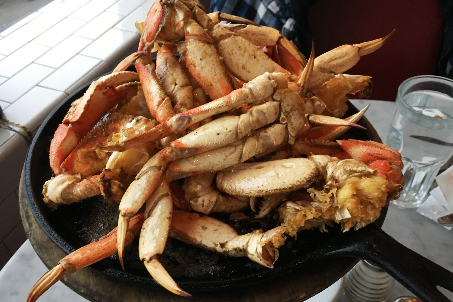 Skillet of roasted crab at the Franciscan Crab Restaurant, Fishermen’s Wharf in San Francisco.