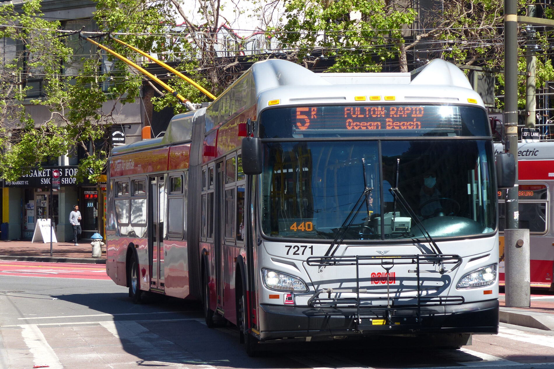 This 5R Fulton Muni bus, headed to Ocean Beach, stops at the 8th Avenue entrance to Golden Gate Park.