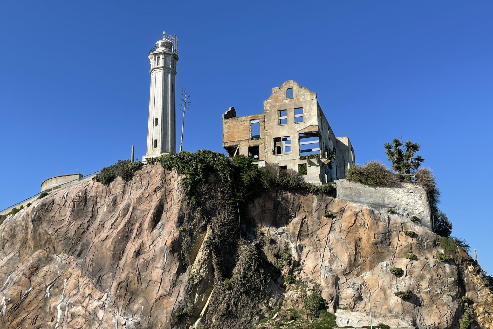 Alcatraz Lighthouse and the ruins of the Warden’s house on Alcatraz.