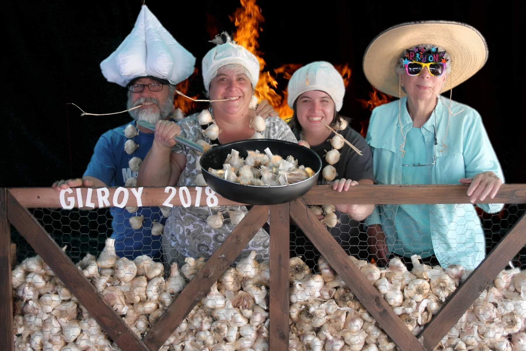 4 people with garlic hats.