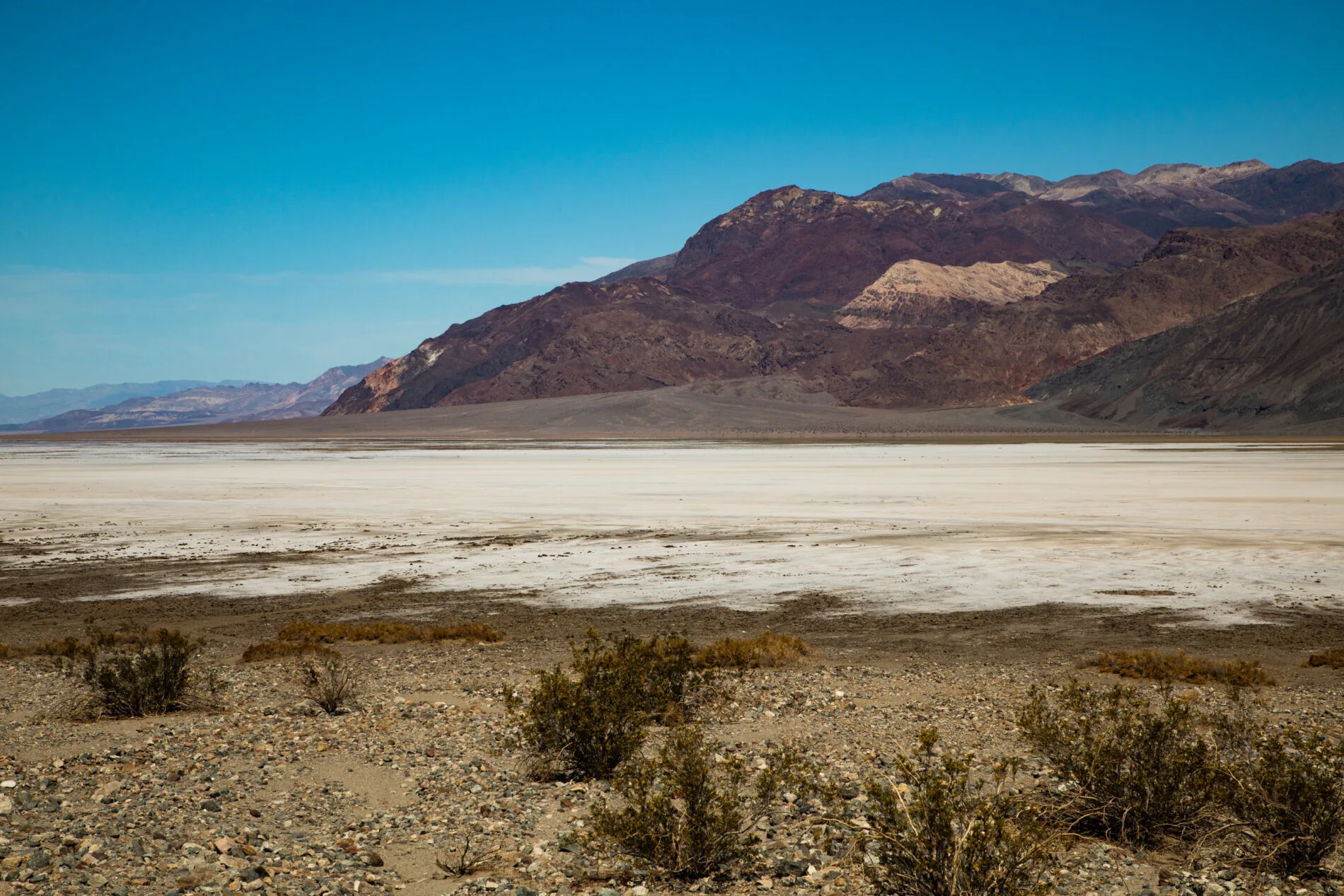 A view down the valley looking towards Badwater Basin on another clear sunny weather day in Death Valley.
