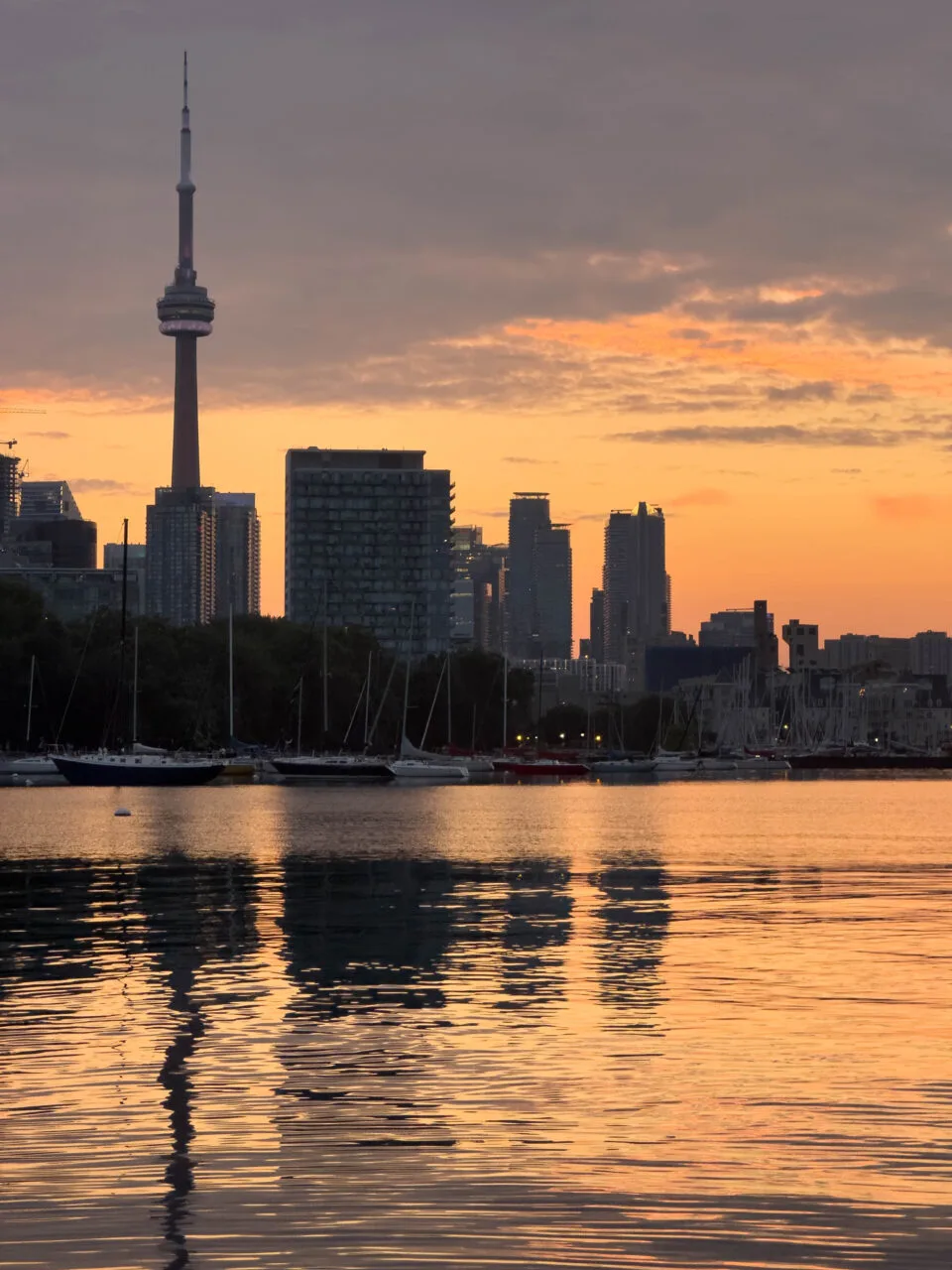 Getting up early to see the sunrise over the Toronto skyline is one of the many free things to do in the city.